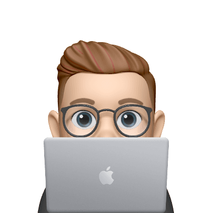 Person peeking from behind a computer